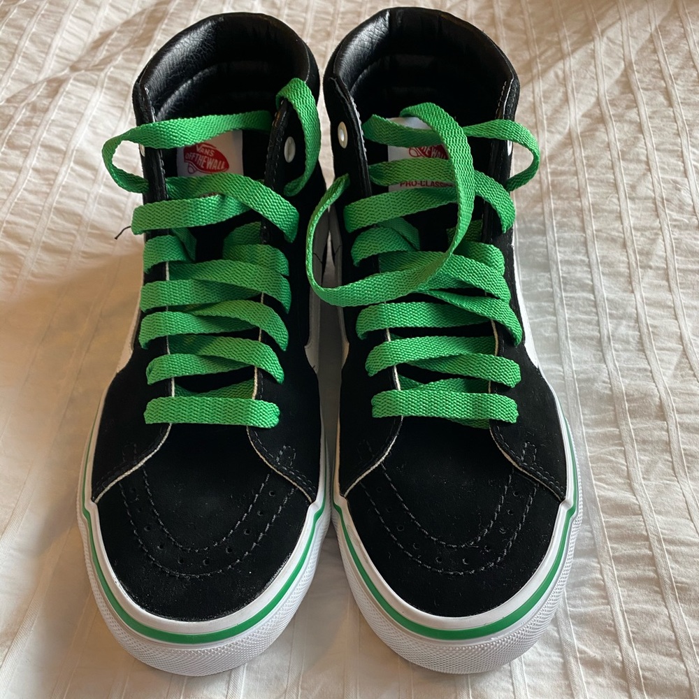 Vans high top sneakers. Men’s 8/women’s 9.5
